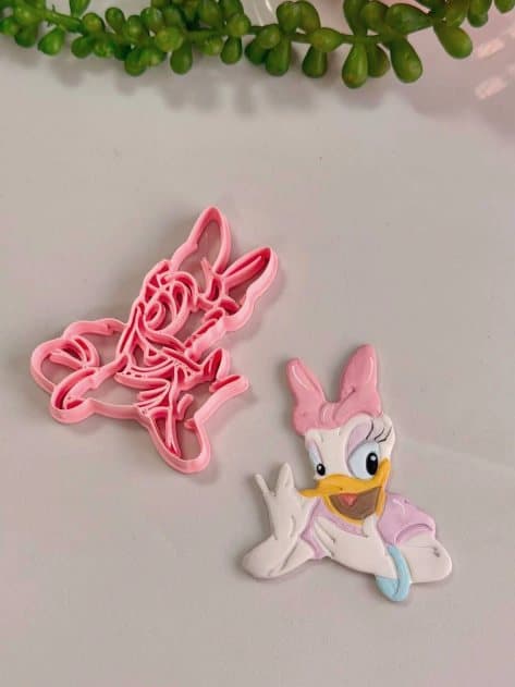 Cortador da Daisy e a peça de pasta americana com laço rosa
